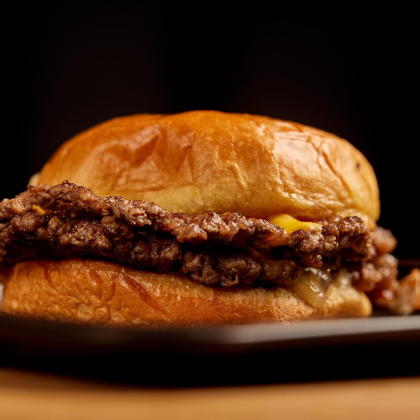 Double smash cheeseburger in a toasted brioche bun